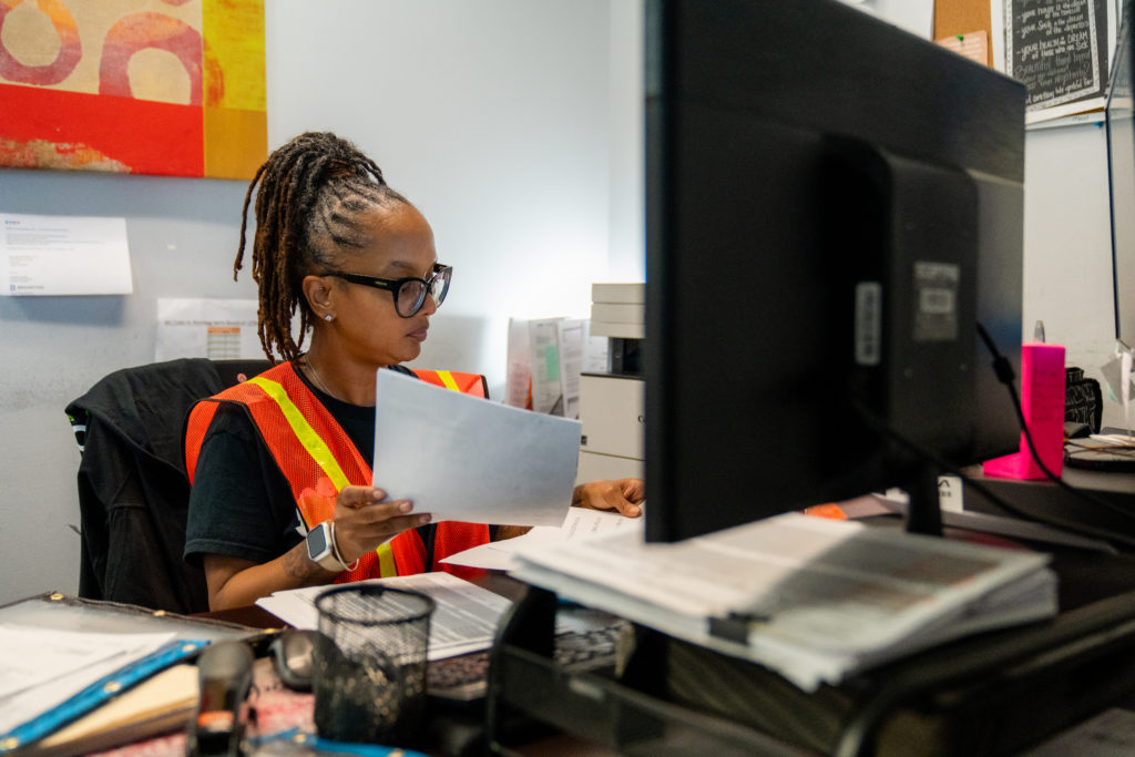 Porter Logistics office employee at desk